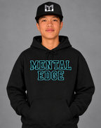 Mental Edge Teal Varsity Hoodie in black, worn by a young athlete