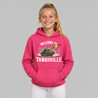 Softball girl wearing the Heliconia pink Welcome to Tanksville youth hoodie