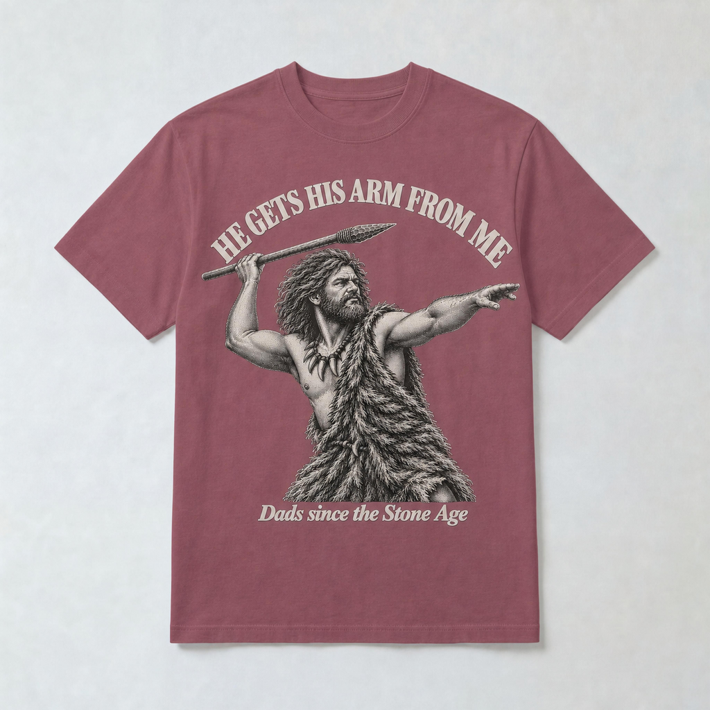 He Gets His Arm From Me Caveman Adult T-Shirt — "Dads since the Stone Age"