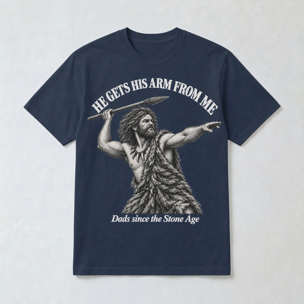 He Gets His Arm From Me Caveman Adult T-Shirt — "Dads since the Stone Age"